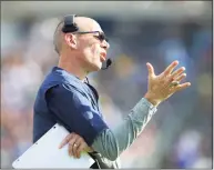  ?? Stew Milne / Associated Press file photo ?? UConn coach Lou Spanos gestures from the sideline during the Huskies game against Purdue on Sept. 11.