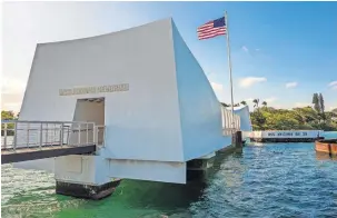  ??  ?? The Pearl Harbor National Memorial reflects how many — but not all — in the U.S. remember and honor WWII today. [COURTESY OF THE NATIONAL WWII MUSEUM]