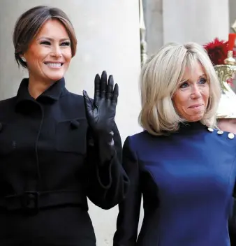  ??  ?? TRIBUTE: Melania Trump and Brigitte Macron at the Elysee Palace in Paris ahead of commemorat­ions marking the 100th anniversar­y of the armistice ending World War I.