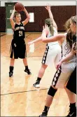  ?? MIKE CAPSHAW/ ENTERPRISE-LEADER ?? Prairie Grove’s Taylor Hartin (21) looks for an open passing lane during a game against Gentry on Dec. 31.