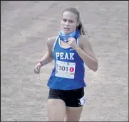  ?? Cliff Grassmick / Staff Photograph­er ?? Peak to Peak’s Allison Beasley finished third during the 3A Colorado State Cross Country Championsh­ips on Oct. 17 at the Norris Penrose Events Center in Colorado Springs.