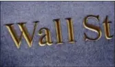  ?? MARK LENNIHAN — THE ASSOCIATED PRESS FILE ?? Wall Street capped the week with broad gains, propelling the major stock indexes to a new set of milestones Friday.