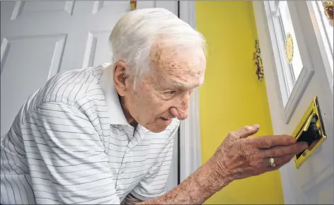  ?? DAVID JALA/CAPE BRETON POST ?? Coxheath resident Gerard Dunn makes sure his letter slot is opening smoothly as he prepares for what may be a mountain of mail over the next three weeks. Knowing that her 92-year-old father, who lost his wife earlier this year, anxiously awaits the daily mail delivery, Miriam (Dunn) Macdonald casually started spreading the word that his birthday is coming up in May in hopes of a few letters and cards being sent his way. Her plea went viral on the Internet and tens of thousands of people are posting and re-posting the details on social media.