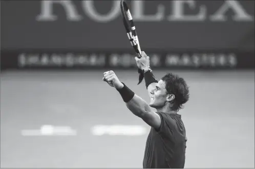  ?? Photo: VCG ?? Rafael Nadal of Spain celebrates his third-round victory over Fabio Fognini of Italy at the Shanghai Masters tennis tournament on Thursday.