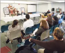  ?? Tyler Sizemore / Hearst Connecticu­t Media ?? Members of the audience get involved during a book launch event at the Government Center in Stamford in 2020 put on by the Parent Leadership Training Institute and other agencies.