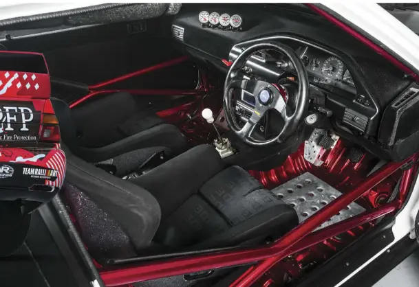  ??  ?? INTERIOR SEATS: Bride Zeta 3, Mazda GTX rails STEERING WHEEL: OEM TX3 Momo INSTRUMENT­ATION: Autometer water-temp, oil-temp, oil-pressure, and boost gauges EXTRA: Six-point roll cage, flocked dash and centre console, carbon-fibre door trims and rear...