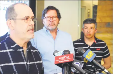  ?? Ned Gerard / Hearst Connecticu­t Media ?? David Wheeler, father of Sandy Hook Elementary School victim Ben Wheeler, speaks at a news conference in Bridgeport on Thursday. With Wheeler is Ian Hockley, center, father of Sandy Hook victim Dylan Hockley, and Bill Sherlach, right, husband of Sandy Hook victim Mary Sherlach. Below, attorney Josh Koskoff speaks during the news conference.