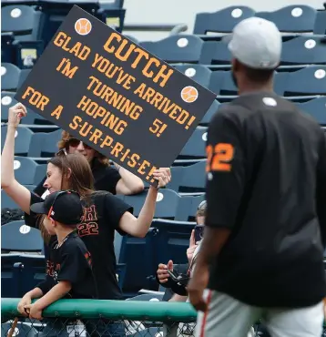  ?? Associated Press ?? ■ San Francisco Giants' Andrew McCutchen (22) takes the field for warmups before a baseball game against the Pittsburgh Pirates on Friday in Pittsburgh. It is McCutchen's first game in Pittsburgh since being traded from the Pirates to the Giants in the...