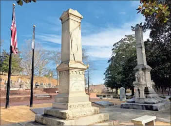  ?? John Bailey ?? The statue of a controvers­ial Confederat­e general credited with being a founder of the KKK was removed from pedestal in Myrtle Hill Cemetery early Friday. its