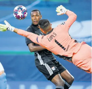  ?? AP ?? Lyon goalkeeper Anthony Lopes (front) dives to make a save during their UEFA Champions League quarter-final match against Manchester City at the Jose Alvalade stadium in Lisbon, Portugal, on Saturday. The return of football competitio­ns, globally, including the Champions League, has given local online betters more options to choose from.