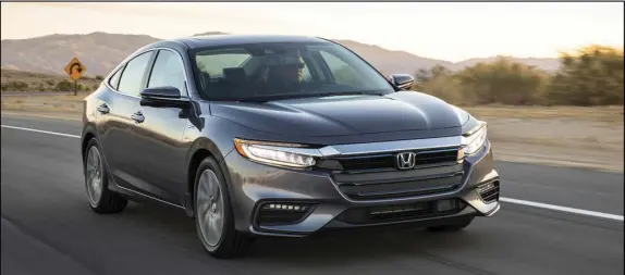  ?? RICHARD RUSSELL PHOTO ?? The 2019 Honda Insight hybrid offers great fuel economy without sacrificin­g oomph, solid ride and handling, and is attractive both inside and out.