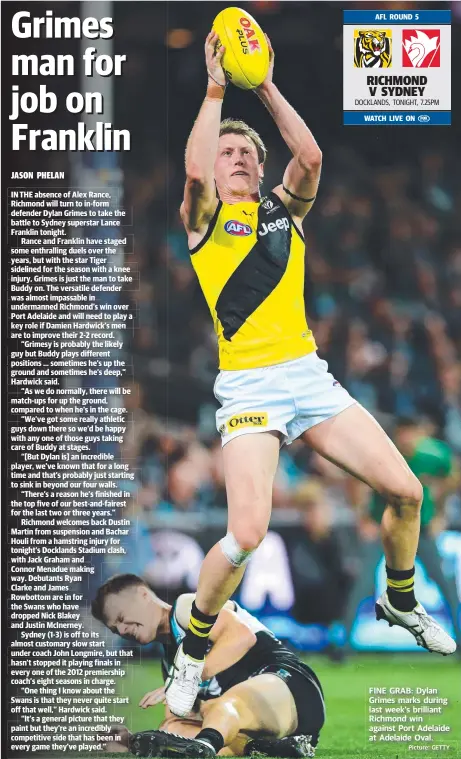  ?? Picture: GETTY ?? FINE GRAB: Dylan Grimes marks during last week’s brilliant Richmond win against Port Adelaide at Adelaide Oval.