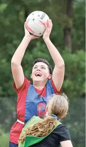  ??  ?? George Morgan enjoys being back out on court for his Warranor team at twlight netball.