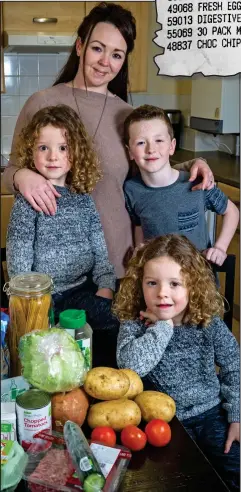  ??  ?? Deliciousl­y frugal: Danielle Ross with sons Max, Ollie and Sam