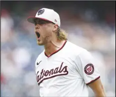  ?? Associated Press ?? Nationals starting pitcher Jake Irvin reacts after he struck out the Mets’ Tyrone Taylor to end the top of the eighth inning, Thursday, in Washington. The Nationals won 1-0.