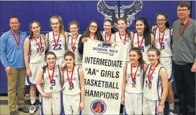  ?? JASON SIMMONDS/JOURNAL PIONEER ?? The Summerside Intermedia­te School Owls won the P.E.I. School Athletic Associatio­n Intermedia­te AA Girls Basketball League championsh­ip on Tuesday night. The host Owls edged the Stonepark Tigers 41-39 in a thrilling gold-medal game. Members of the Owls...