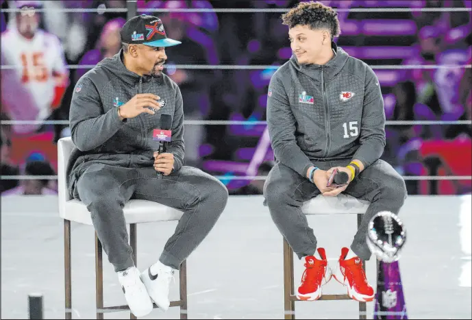  ?? Ross D. Franklin The Associated Press ?? Super Bowl quarterbac­ks Jalen Hurts of the Eagles, left, and Patrick Mahomes of the Chiefs led their teams to the best regular-season records in the NFL.
