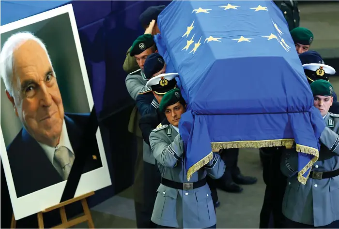  ?? Francois Lenoir / Reuters ?? A memorial service for the former German chancellor Helmut Kohl, his coffin draped in the European flag, was held at the European Parliament in Strasbourg yesterday.