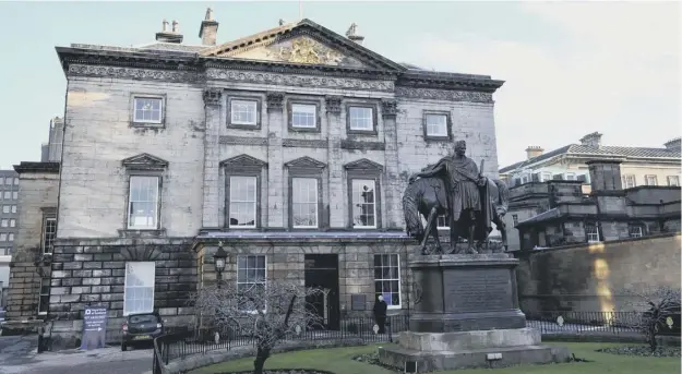  ?? PICTURE: IAN RUTHERFORD ?? 0 The new concert hall, to be known as The Impact Centre, will be built on a space behind the Royal Bank of Scotland building