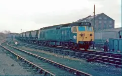  ??  ?? Slow speed control equipment enabled Class 50 to power MGR trains. 50006 waits at Warrington Arpley on December 16, 1975 for a preceding train to clear Fiddlers Ferry power station before heading there with coal from a local colliery. (Gerry Bent)