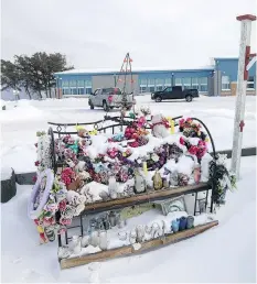  ?? LIAM RICHARDS/FILES ?? A memorial outside the La Loche Community School in 2017. Counsellin­g staff will help students if they need it, in anticipati­on of high emotions after the shooter’s sentencing.