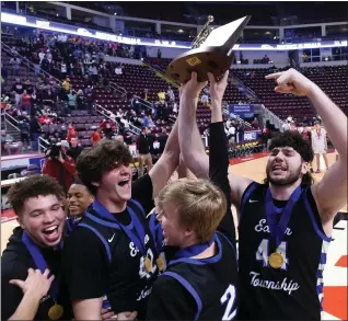  ?? BILL UHRICH — READING EAGLE ?? Exeter players celebrate after beating Manheim Central to win the District 3Class 5A championsh­ip Thursday at Giant Center.