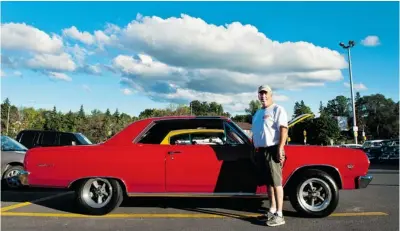  ?? BRUCE DEACHMAN/OTTAWA CITIZEN ?? Roger Thomas, seen with his 1965 Chevy Malibu, operates the Kanata car night every Tuesday at the Hazeldean Mall.