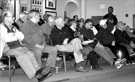  ?? MONIQUE CHIASSON  TRURO DAILY NEWS ?? Truro resident Francis Collins, standing, offered ideas on how to deal with local flooding during a public meeting on Thursday night. One suggestion Collins made was getting the town to stop allowing people to develop on flood plains.