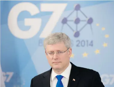  ?? ADRIAN WYLD/The Canadian Press ?? It’s a wonder Prime Minister Stephen Harper remained civil with the leaders of France, Britain and Germany, which all
cosied up to neighbourh­ood bully Russian President Vladimir Putin during D-Day ceremonies last week.