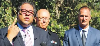  ?? JIM WELLS ?? Mayor Naheed Nenshi reflects on how Calgary has changed after the flood. He was joined by Tom Sampson, chief of the Calgary Emergency Management Agency, centre, and Frank Frigo, leader of Watershed Analysis.