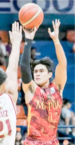  ?? PHOTOGRAPH COURTESY OF NCAA ?? CLINT Escamis rises to the occasion anew as Mapua University mangles University of Perpetual Help, 69-53, in Season 99 NCAA basketball tournament Wednesday at the Filoil EcoOil Centre in San Juan.