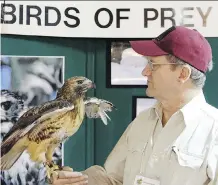  ??  ?? Karl Grantmyre of the Alberta Society for Injured Birds of Prey says the 50-year-old structure can be rebuilt — “the big loss here are the birds.”