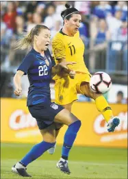  ?? Jessica Hill / Associated Press ?? Australia’s Lisa De Vanna (11) shoots on goal as United States’ Emily Sonnett (22) defends on Sunday.