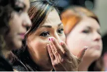  ?? Manuel Balce Ceneta/The Associated Press ?? Rosie Cortinas, centre, listens to details of the GM Ignition Compensati­on Program. She said her son Amador, 23, died in an accident involving “a defective GM vehicle.”