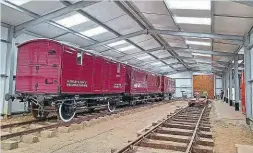  ?? ?? Three Great Eastern Railway vehicles have already taken up undercover residence in the East Anglian Railway Museum’s new display shed. A raised walkway between the two tracks shall be installed in time, allowing step-free access for all to see future displays within the building. EARM