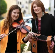  ?? Photo by Domnick Walsh ?? Sister Act: Ardfert siblings Danielle and Melissa O’Riordan getting Tralee in the mood for that trad music magic ahead of Fleadh Cheoil Chiarraí.