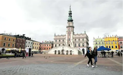  ?? FOT. JAKUB ORZECHOWSK­I / AGENCJA WYBORCZA.PL ?? Rynek Wielki w Zamościu