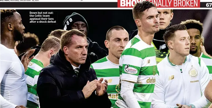  ??  ?? Down but not out: the Celtic team applaud their fans after a shock defeat