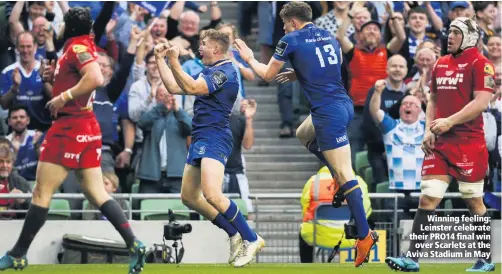  ??  ?? Winning feeling: Leinster celebrate their PRO14 final winover Scarlets at the Aviva Stadium in May