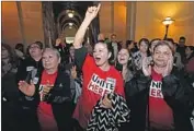  ?? Mel Melcon Los Angeles Times ?? HOTEL workers celebrate a City Council vote to regulate and restrict night-to-night rentals of homes.