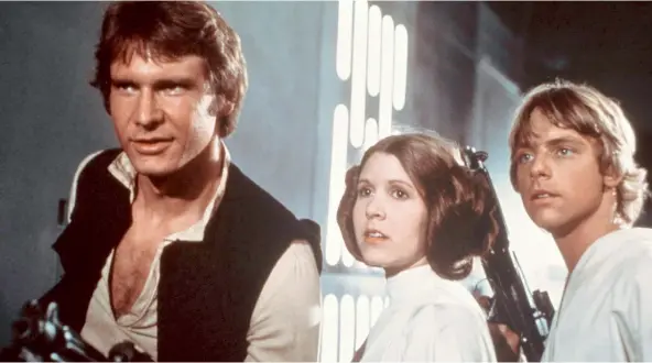  ??  ?? Space cowboys Harrison Ford, Carrie Fisher and Mark Hamill in Star Wars: Episode IV A New Hope in 1977