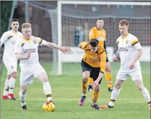  ?? Photo: Abrightsid­e Photograph­y ?? Forres defenders struggle to contain Fort top goal scorer Scottie Davidson.