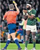  ?? ?? Right call: Siya Kolisi is shown yellow for taking England’s Joe Marchant out in the air