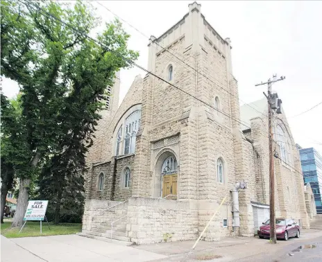  ?? KAYLE NEIS ?? Parishione­rs gathered Sunday for the final service at Third Avenue United Church. The 105-year-old structure has been sold.