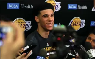  ?? SEAN M. HAFFEY, GETTY IMAGES ?? NBA Prospect Lonzo Ball speaks with the media after a workout with the Los Angeles Lakers on June 7.