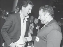  ?? Ted Rhodes/calgary Herald ?? Philanthro­pist Brett Wilson, right, chats with Liberal leadership candidate Justin Trudeau on Monday night during a campaign stop at Calgary’s Hotel Arts.