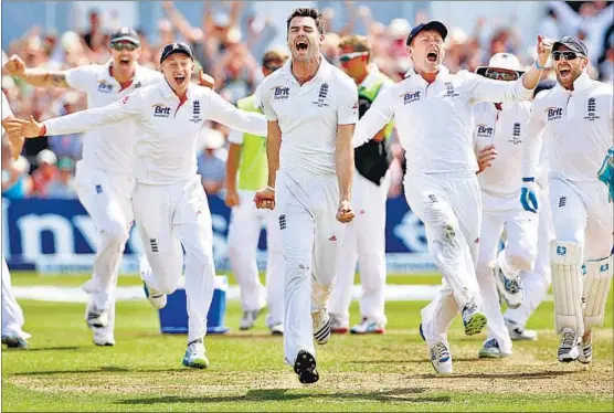  ?? REUTERS PHOTO ?? England bowling hero James Anderson leads his ecstatic team members after beating Australia on the fifth and final day of the first Ashes Test at Trent Bridge on Sunday.
