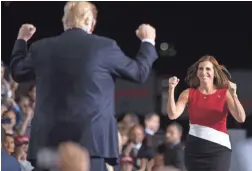  ??  ?? Martha McSally erred in aligning herself so closely with President Donald Trump, such as at this Mesa rally in mid-October.