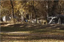  ?? CARIN DORGHALLI — ENTERPRISE-RECORD ?? The area between Annie’s Glenn and One-Mile Recreation Area is full of encampment­s Monday in Chico.