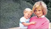  ?? AFP ?? A file picture of Princess Diana holding Prince William while pregnant with Prince Harry at an undisclose­d location.